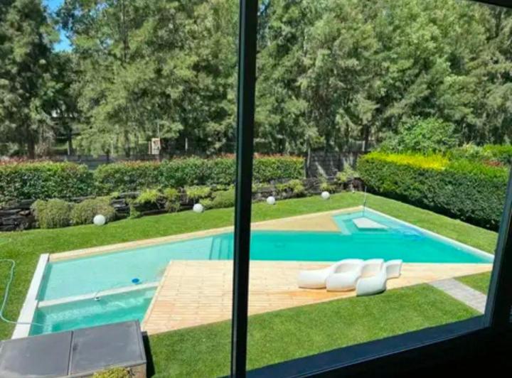 Casa · 349m² · 6 Ambientes · 4 Cocheras