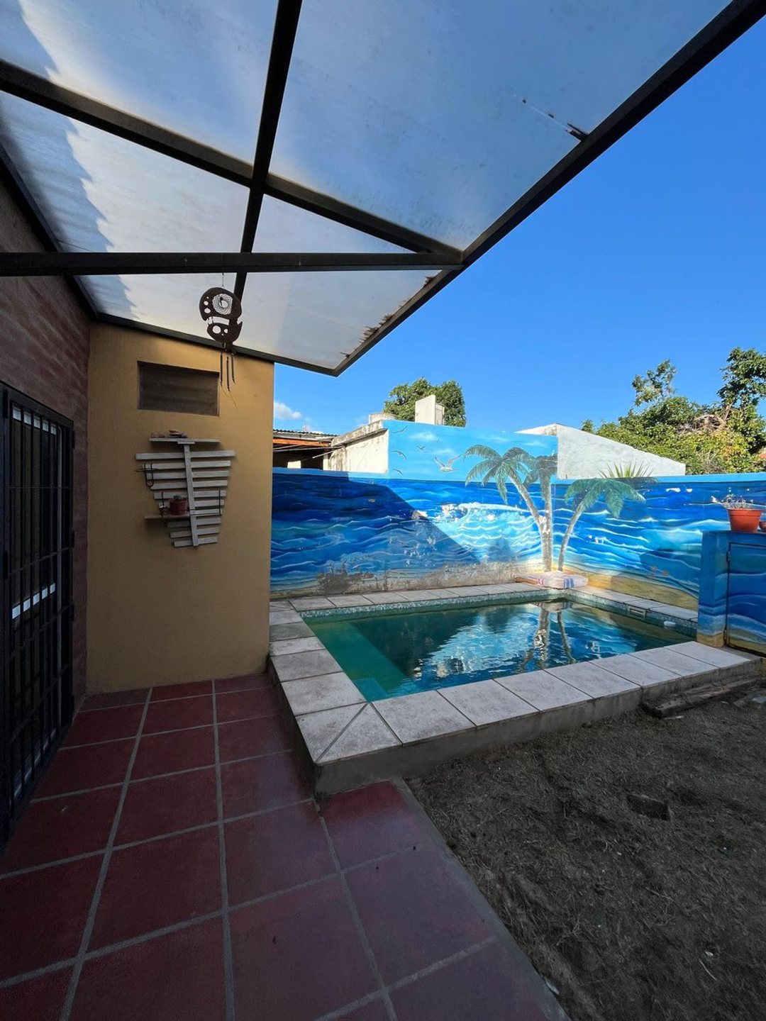 Casa con pileta y quincho Santoto