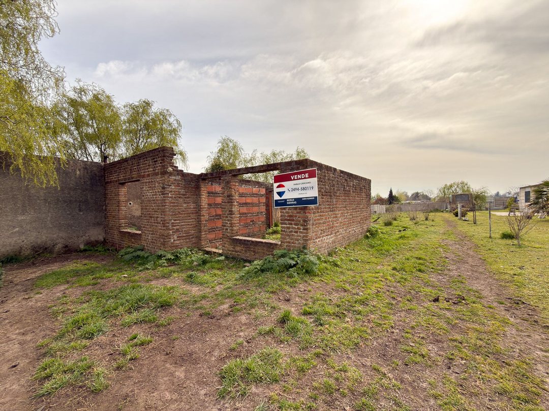 LOTE CON CONSTRUCCION