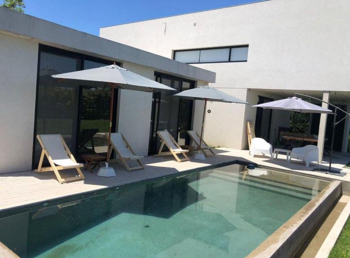 Casa · 128m² · 4 Ambientes · 2 Cocheras