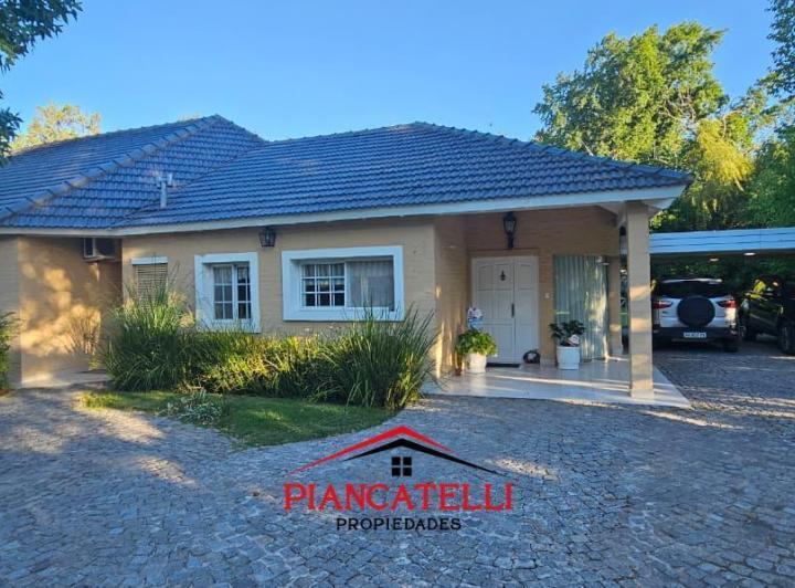Casa · 340m² · 4 Ambientes · 6 Cocheras