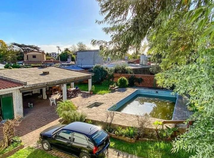 Casa · 200m² · 6 Ambientes · 1 Cochera