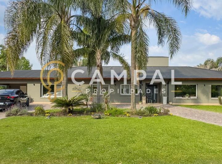 Casa · 480m² · 6 Ambientes · 1 Cochera