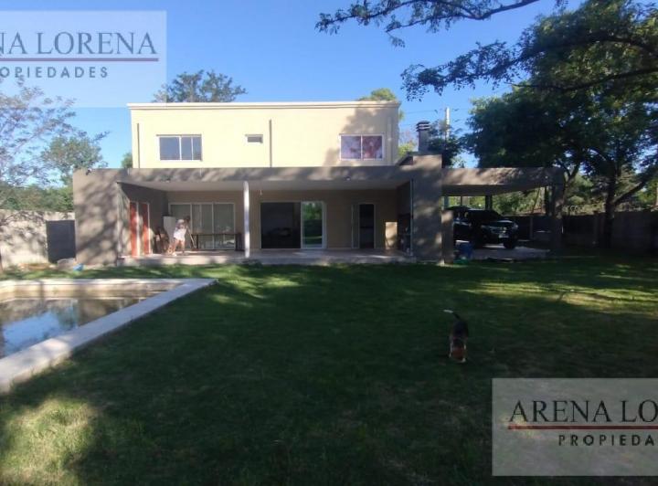 Casa · 210m² · 5 Ambientes · 6 Cocheras