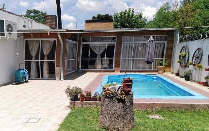 Casa · 200m² · 4 Ambientes · 1 Cochera