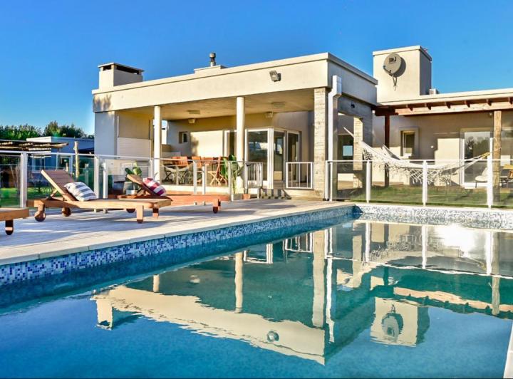 Casa · 320m² · 6 Ambientes