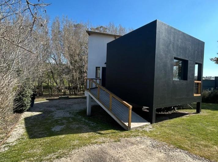 Casa · 210m² · 5 Ambientes · 2 Cocheras