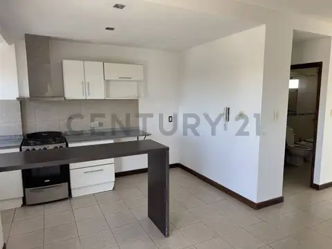 Departamento en alquiler con cochera y terraza privada