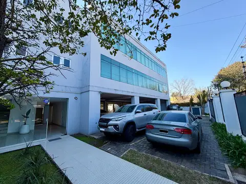 Impecable oficina en venta con renta, con cinco cocheras, ubicada en martínez, san isidro.