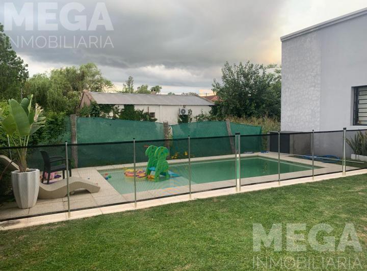 Casa · 260m² · 4 Dormitorios · 2 Cocheras