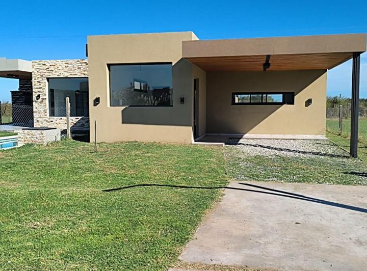 Casa · 130m² · 3 Ambientes · 2 Cocheras