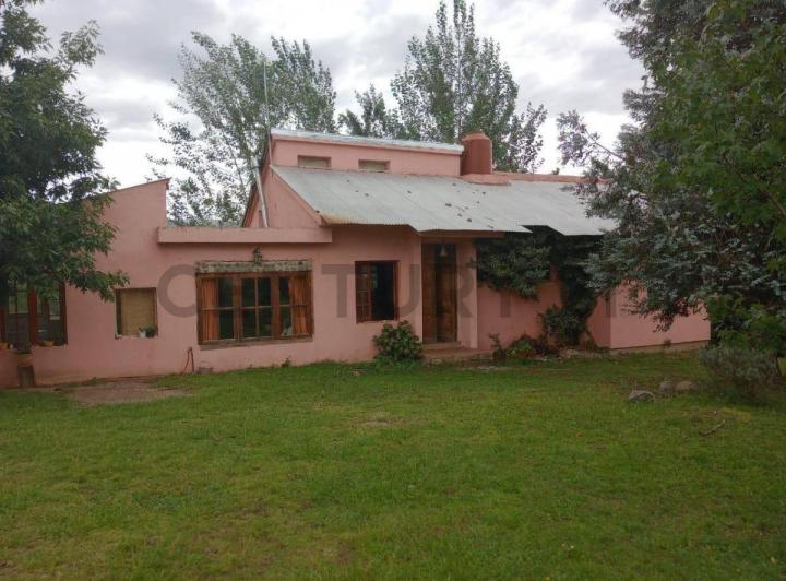 Casa · 214m² · 6 Ambientes · 1 Cochera