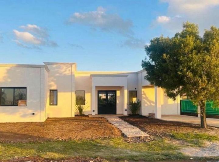 Casa · 123m² · 4 Ambientes · 1 Cochera