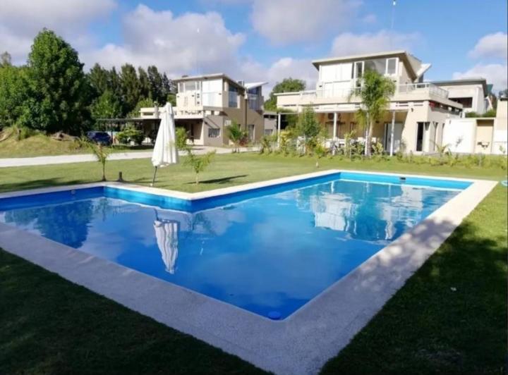 Casa · 65m² · 4 Ambientes · 1 Cochera