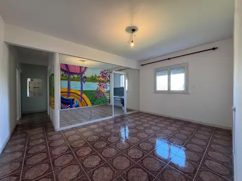 4 ambientes con cocina separada.