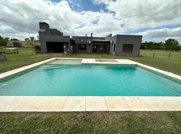 Casa · 130m² · 5 Ambientes · 2 Cocheras