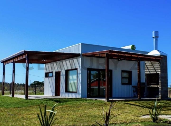 Casa · 210m² · 2 Ambientes · 2 Cocheras