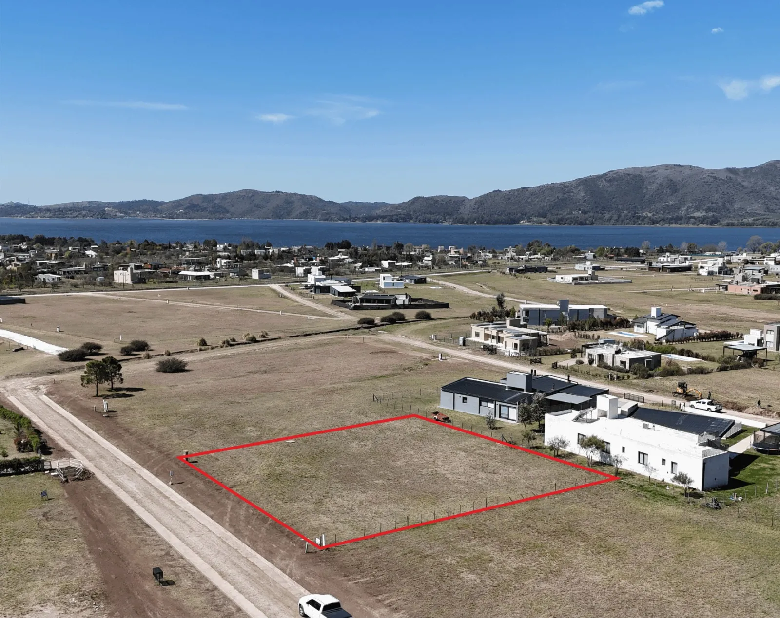 Lote en Puerto del Águila 1300 m² con vista al lago y las sierras+ amenities