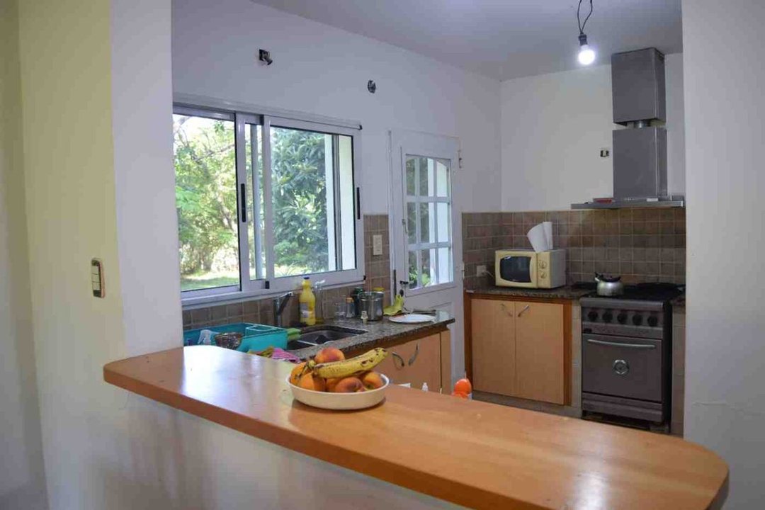 LOTE  CON CASA EN VENTA EN CHACRAS DE CANNING