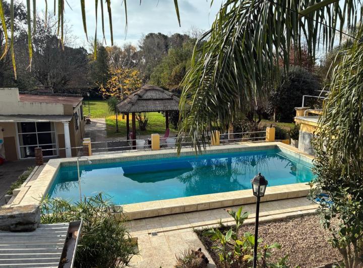 Casa · 321m² · 6 Ambientes · 4 Cocheras