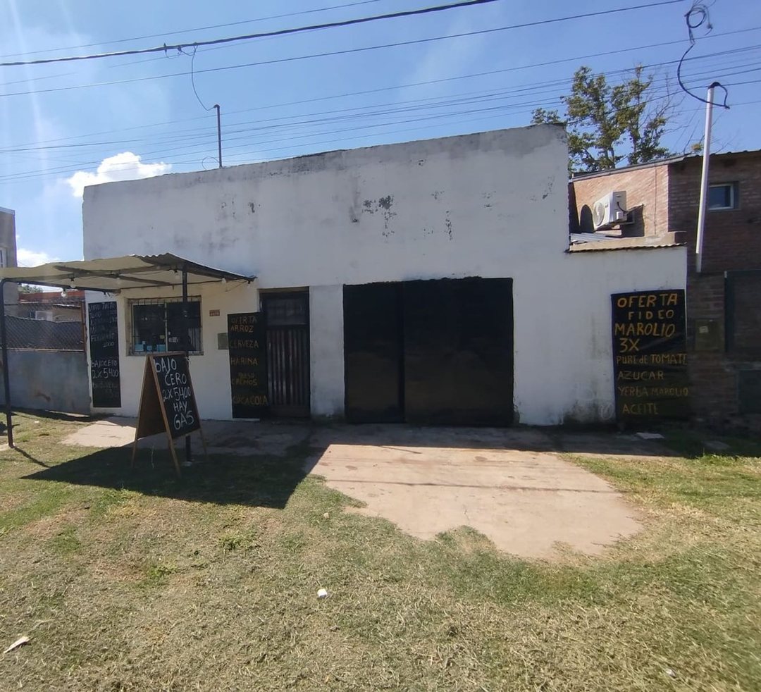 CASA DE 7 AMBIENTES CON TALLER DE AUTOS Y LOCAL