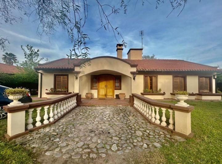 Casa · 310m² · 7 Ambientes