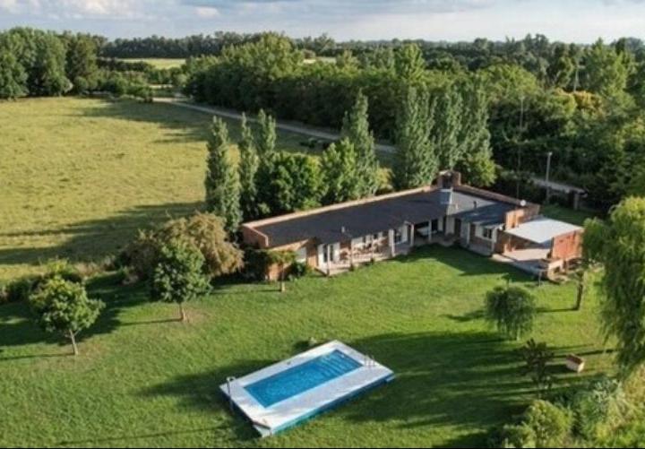 Casa · 250m² · 4 Ambientes · 2 Cocheras