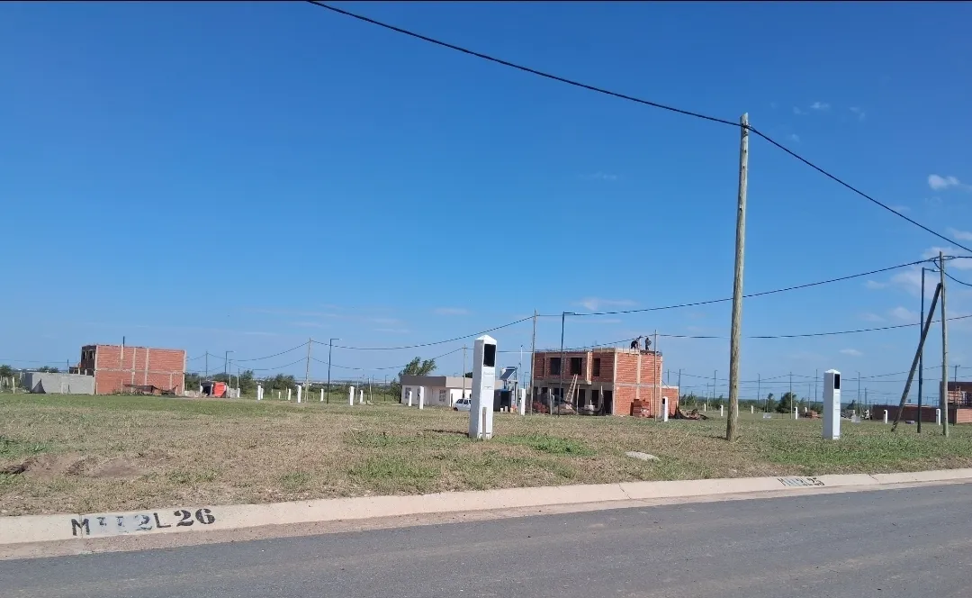 Vendo lote al frente de espacio verde docta central.  Inmobiliarias abstenerse .