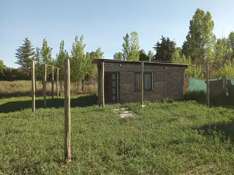 Hermoso terreno con casa pequeña