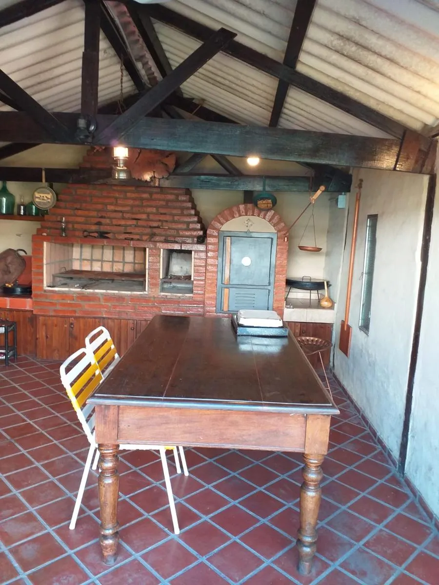 VENTA | Casa 3 dorm, 2 baños - Con quincho y patio de 60 m² en B° Parque Horizonte - THO11826885