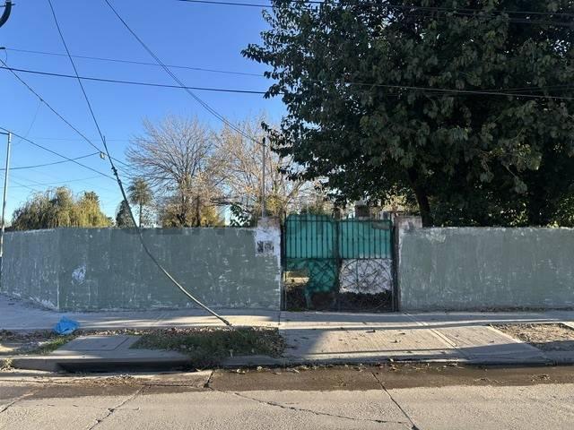 Terreno · 128m² · 6 Ambientes · 1 Cochera