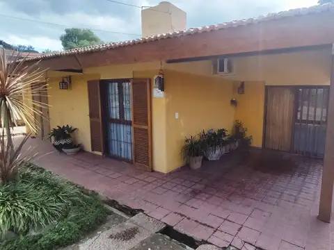 Venta casa y dos deptos carlos paz escritura