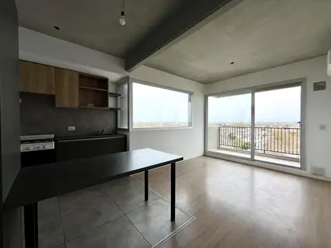 Departamento de un dormitorio en alquiler con balcón,cochera y amenities