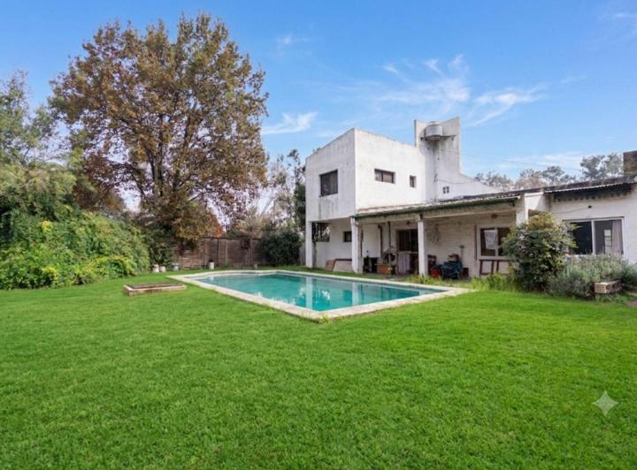 Casa · 130m² · 4 Ambientes · 1 Cochera