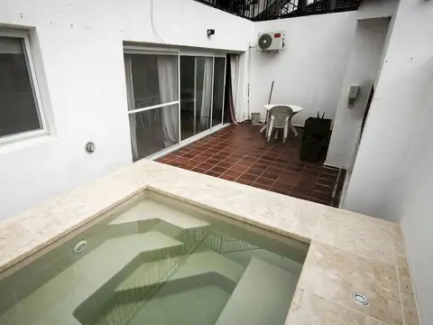 Carlos paz venta dpto pb con patio en b.santa rita