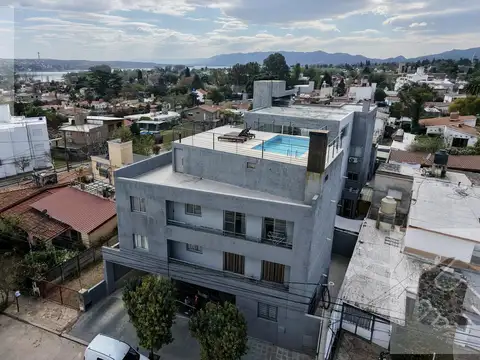 Departamento de dos habitaciones, 2 baños y cochera en villa carlos paz pap