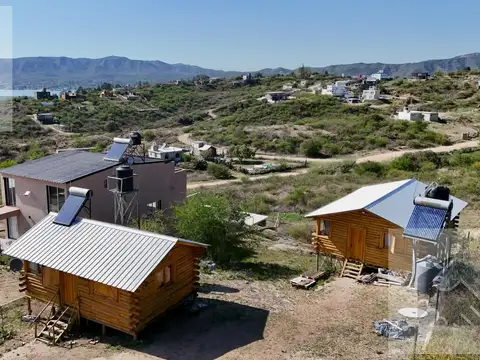 Dos cabañas en venta en villa carlos paz con vista al lago.
