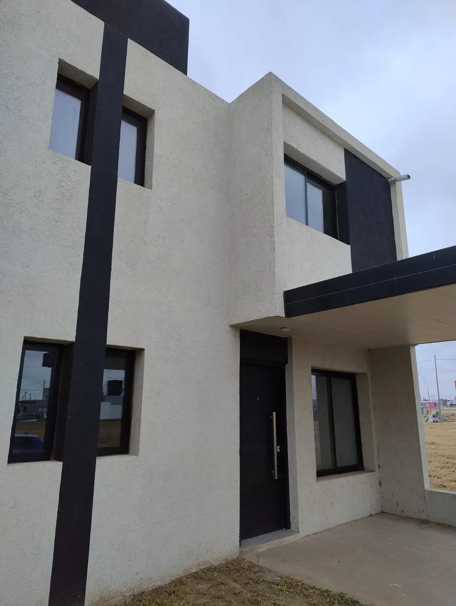 Duplex en Venta en Cuestas de Manantiales! 2 dormtiorios, calefaccion central