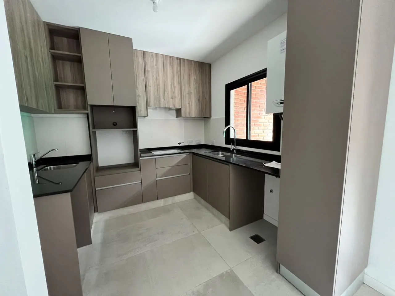 Departamento 2 dorm. A estrenar. Bº Jardín. Con COCHERA y AMENITIES