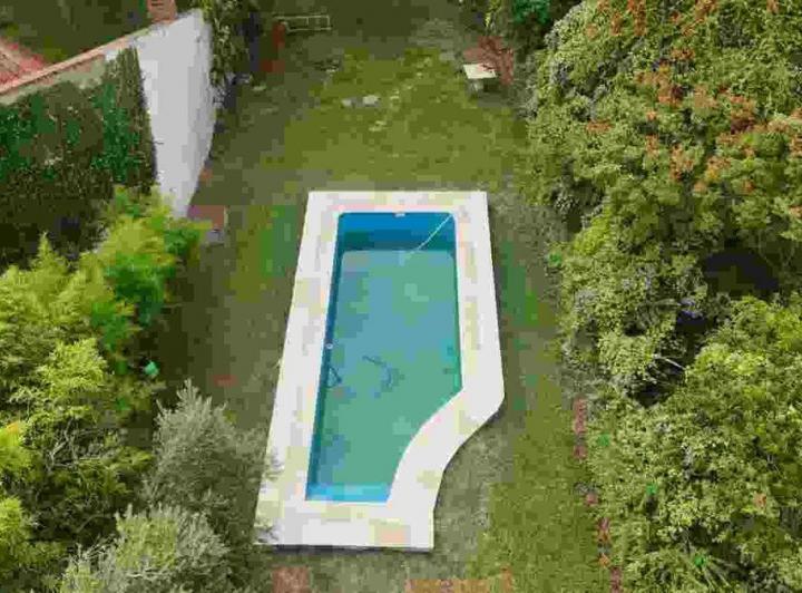 Casa · 339m² · 6 Ambientes · 2 Cocheras