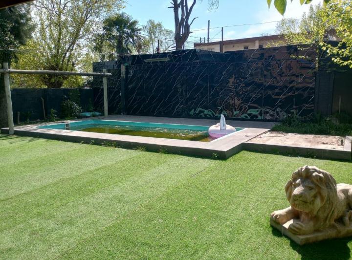 Casa · 210m² · 4 Ambientes · 2 Cocheras