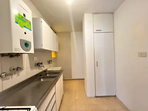 Alquiler departamento rosario 2 dormitorios balcon frente san lorenzo y españa cocina separada
