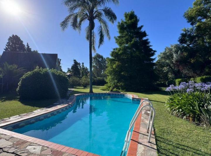 Casa · 200m² · 4 Ambientes · 1 Cochera