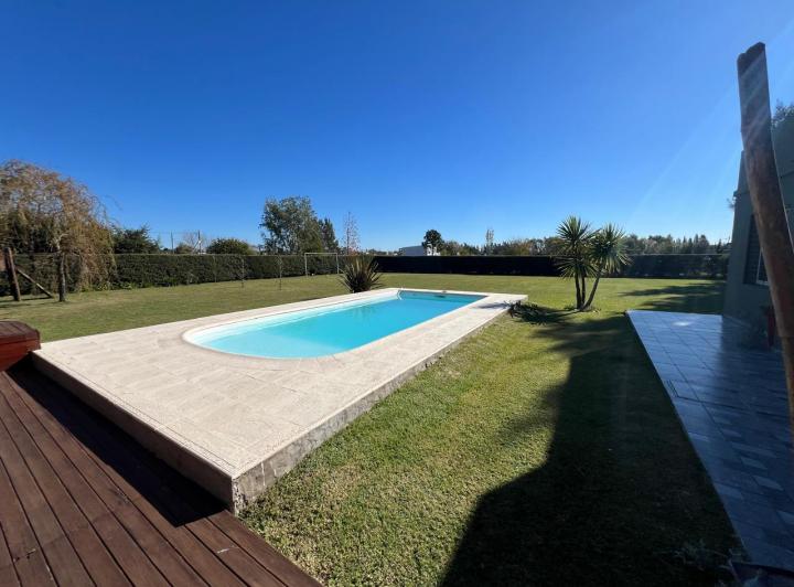 Casa · 130m² · 5 Ambientes · 4 Cocheras