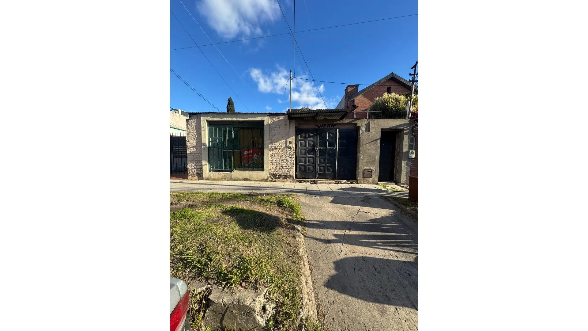 Tres casas, local y garaje sobre lote de 433 m² OPORTUNIDAD