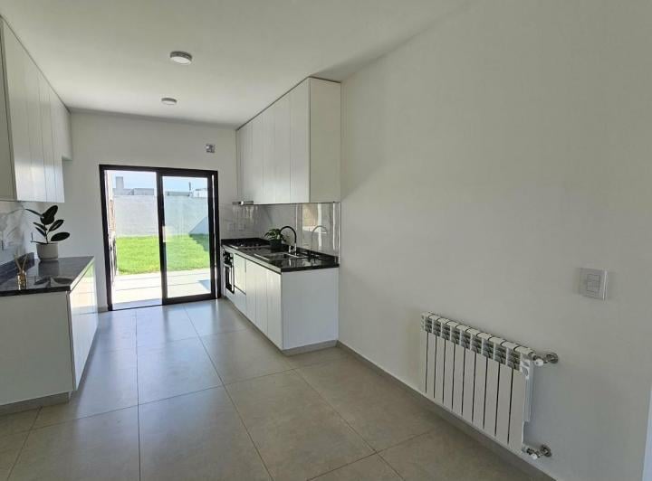 Casa · 70m² · 4 Ambientes · 1 Cochera